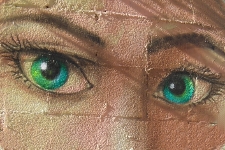 Graffiti con ojos verdes