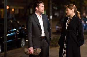 Michael junto a Eva Mendes (Laura)