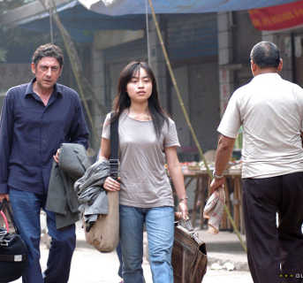 Vincenzo Buonavolont� (Sergio Castellitto) y Liu Hua (Ling Tai)