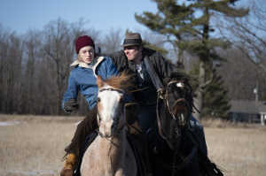 Willis y su hijo John Peterson, interpretado de adolescente por William Healy