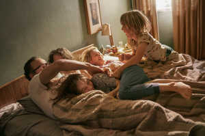 Sam Bloom junto a su familia