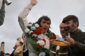 El piloto escocés celebrando una de sus muchas victorias El piloto escocés celebrando una de sus muchas victorias